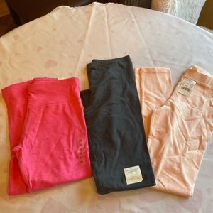 Three pairs of girls leggings. New with tags. Sizes 10.